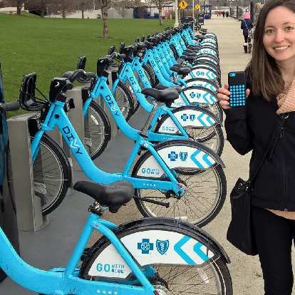 The cyan-blue Chicago city share bikes matched Maureen's phone.