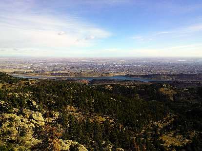 The view of Horsetooth Mountain Park, Horsetooth Reservoir, and Fort Collins beyond.