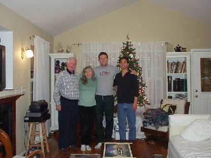 We stayed warm by having dinner and a mini-concert at my neighbors' during the blizzard.  Here's Dick, Dee, Tim, and I.