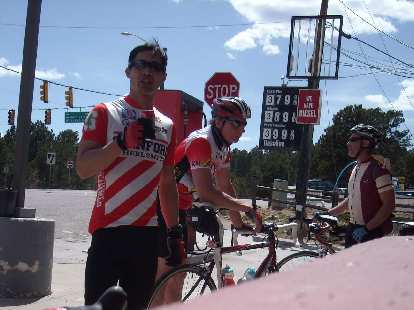 [Mile 123, 3:32 p.m.] At the Pine Junction checkpoint after yet another long, grueling climb.  Time for a Coke.