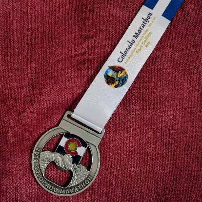 The finishing medal for the 2019 Colorado Marathon.