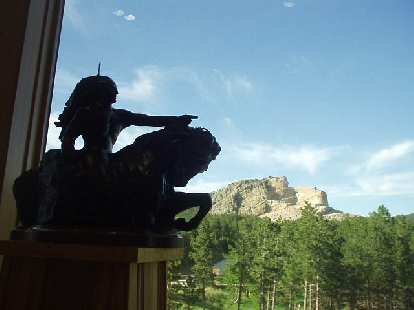 "My lands are where my dead lie buried" said Crazy Horse.  The rock sculpture will  look like the reduced scale model shown here when it is completed.