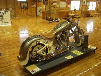A custom Crazy Horse cruiser bike inside the Orientation Center.