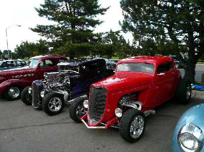 When I went grocery shopping at the Sunflower Market, I was surprised to see a bunch of hot rods in the parking lot.