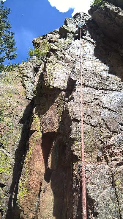 Felix Wong climbing County Line (5.8) in the Southwest Alcove of Crystal Wall.