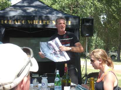 Mark giving away an autographed poster of Andy Hampsten from the 80s.