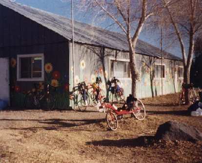 Felix Wong's red Reynolds Wishbone recumbent at the Shoshone rest stop during the 2000 Death Valley Double Century. red Reynolds Wishbone recumbent, Shoshone rest stop, 2000 Death Valley Double Century