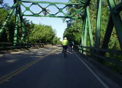 [Mile 10, 7:40 a.m.] Riders ahead on a bridge.