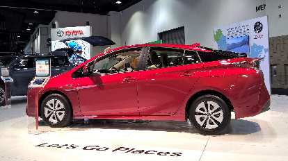 Red 2016 Toyota Prius. Red 2016 Toyota Prius.