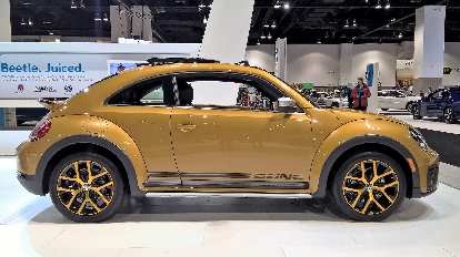 Gold 2016 Volkswagen Dune Beetle. Gold 2016 Volkswagen Dune Beetle.