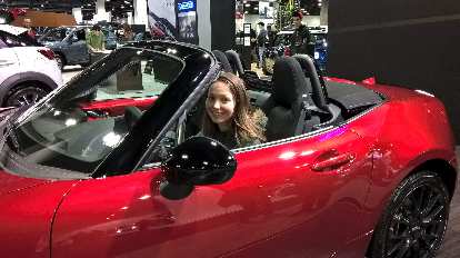 Maureen in the red 2016 Mazda MX-5/Miata. Maureen in the red 2016 Mazda MX-5/Miata.