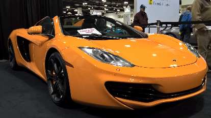 Orange McLaren MP4-12C spider, maybe a 2014 model. Orange McLaren MP4-12C spider, maybe a 2014 model.