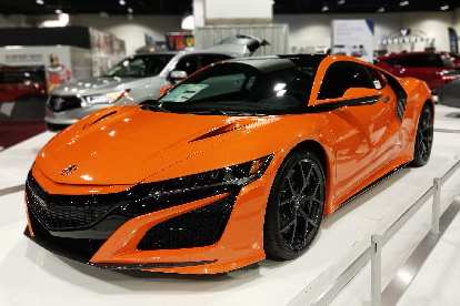 An orange 2019 Acura NSX. An orange 2019 Acura NSX.