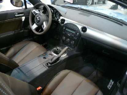 Photo: The interior of the 2009 Miata is a features good fit and finish and is much more elegant than the first two generations'.