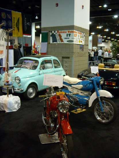 A couple classic motorcycles (including an MV Agusta) and Fiat 500.