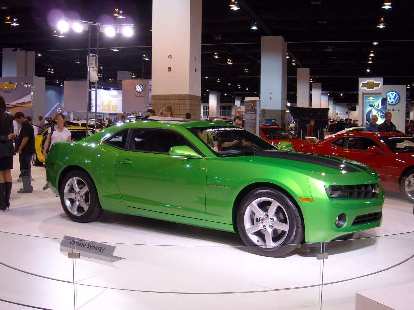 Compared to the Stingray concept, the Camaro looks quite bland even in this odd shade of green.