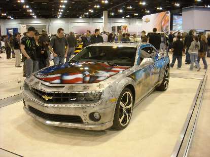 A Chevrolet Camaro painted with a patriotic motif.