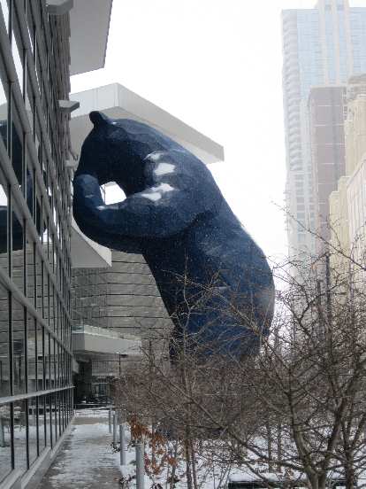 The Blue Bear peaking into the Denver Convention Center to look at cars. The Blue Bear peaking into the Denver Convention Center to look at cars.