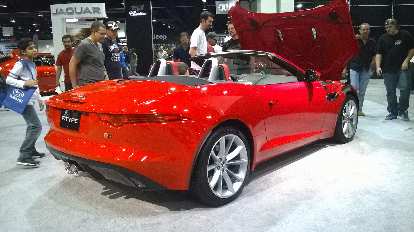 Red Jaguar F-Type convertible.