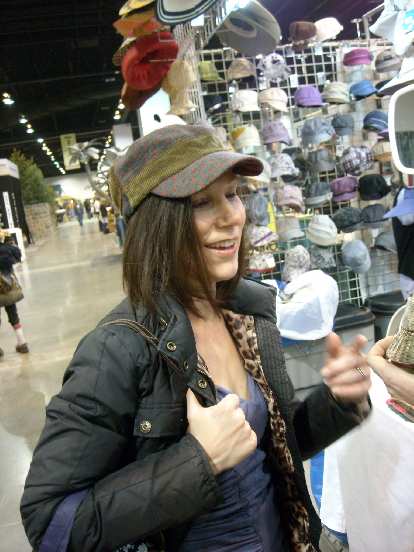 Lisa wearing a stylish hat. Lisa wearing a stylish hat.