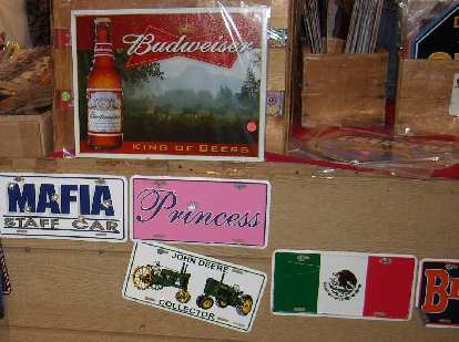 Mafia, Princess, and Jon Deere license plates.