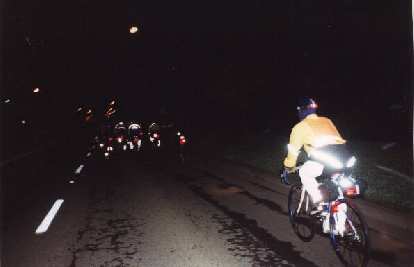 Mass start of >100 riders at 5:00 a.m.  Up ahead is the lead pack.