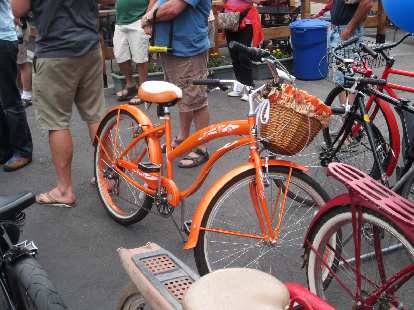 Orange cruiser with basket. Orange cruiser with basket.