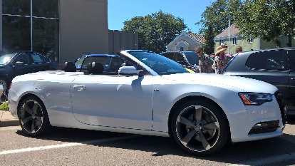 A white 2012 Audi A5 Convertible. A white 2012 Audi A5 Convertible.