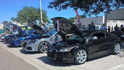A black 2009 Audi TTS coupe. A black 2009 Audi TTS coupe.