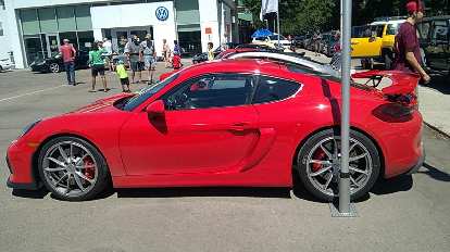 A red 2016 Porsche GT4 based off the Porsche Cayman. A red 2016 Porsche GT4 based off the Porsche Cayman.