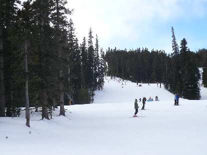 Skiers at the base of the Bunnyfair ski run.