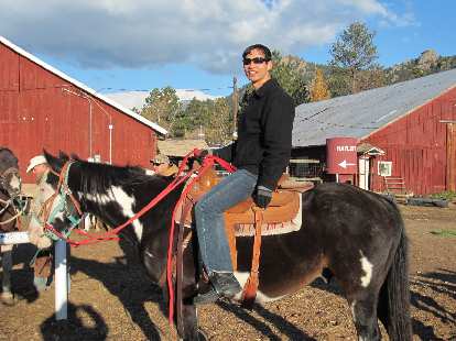 Felix Wong on a horse. Felix Wong on a horse.
