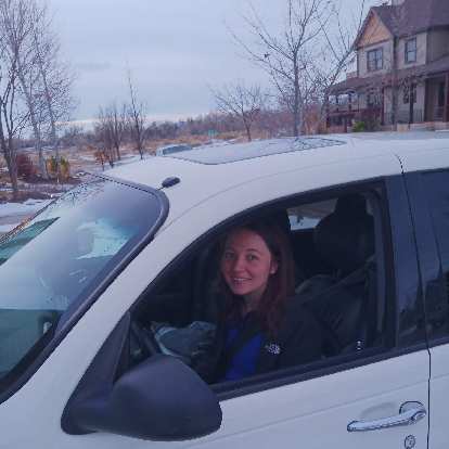 Maureen in her new car!