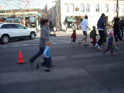 Dana and Alistair running in the free kids run, the Gobble Gobble.
