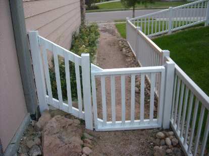 An "after" shot of the rear of the side gate and fence.