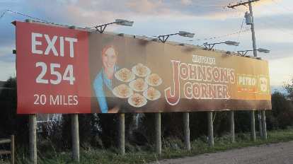 Billboard for Johnson's Corner's world-famous cinnamon rolls.