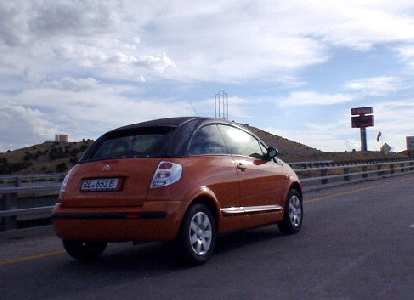 On the way to Flagstaff, I spotted this little French car -- a Citroen C3 Pluriel -- still with European plates. Isn't it cute? On the way to Flagstaff, I spotted this little French car -- a Citroen C3 Pluriel -- still with European plates. Isn't it cute?