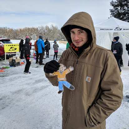 Flat Stanley with Carl during the Lee Martinez Park 10k Tortoise & Hare race, which was 1 degree Fahrenheit at the start.