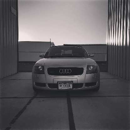 My silver Audi TT Roadster Quattro looked good among the airplane hangars. My silver Audi TT Roadster Quattro looked good among the airplane hangars.
