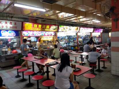 At the Chinatown Market in Singapore, there were hundreds of food stalls with good, cheap food.