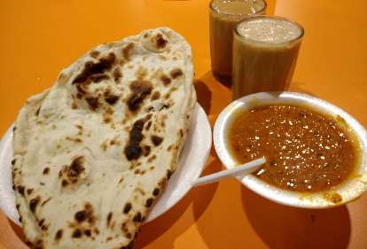Late night Naan, daal, and chai (I think) in Little India.