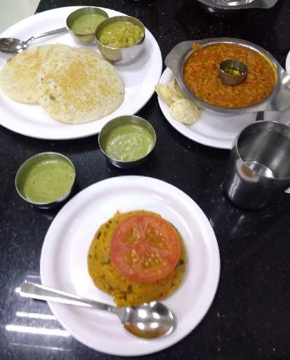 Set dosa (3 pieces), bisibele bhath, and khara bhath at MTR 1924 Vegetarian Restaurant in Little India, Singapore.