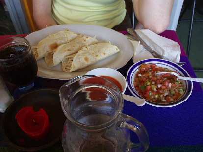 Eating delicious Mexican food at a Mexican Restaurant off of Avenida Central. Panamanian cuisine does not use many tortillas unlike Mexican food. (09 Mar 2007) Photo: Eating delicious Mexican food at a Mexican Restaurant off of Avenida Central. Panamanian cuisine does not use many tortillas unlike Mexican food.