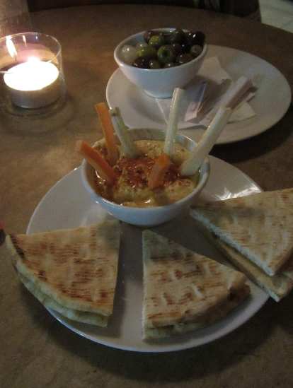 Pita bread and hummus. Pita bread and hummus.