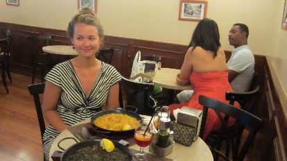 Katia and delicious paella dishes. Katia and delicious paella dishes.