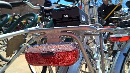 Rear taillight on Zagster city share bicycle.