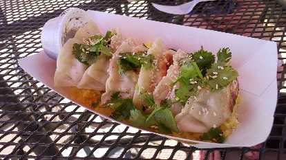 Seared dumplings from the Umami food truck outside of Odell's Brewery in Fort Collins. (29 Jul 2015) seared dumplings, Umami food truck