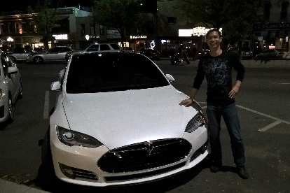 Felix Wong, white Tesla Model S