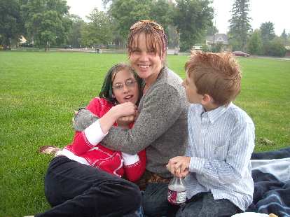 Cheyenne, Tanya, and Davy, all quite drenched at our picnic.