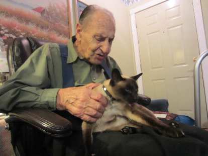 Frank with his cat Mushka. Frank with his cat Mushka.